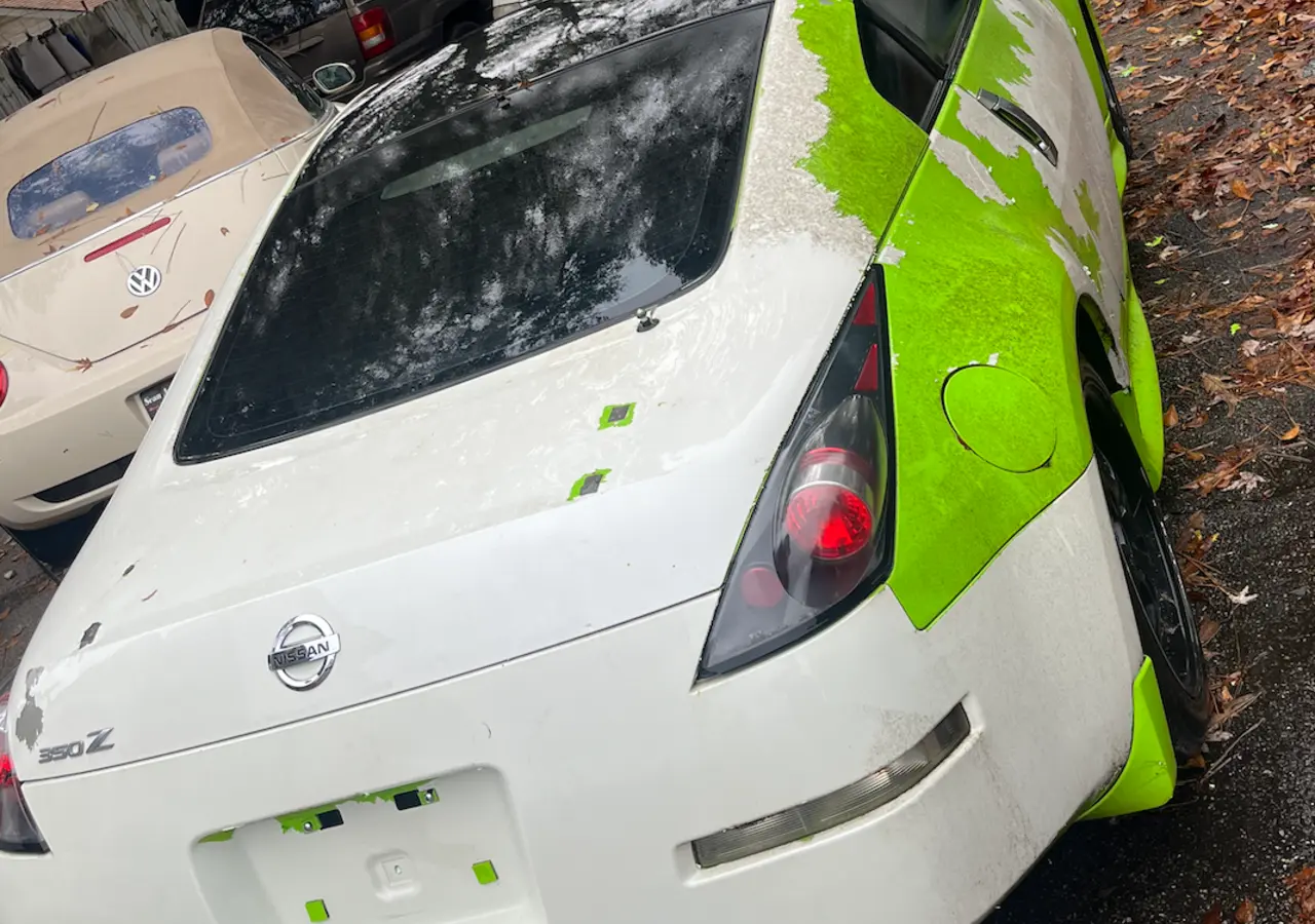 Nissan 350Z damaged paint finish before refinishing